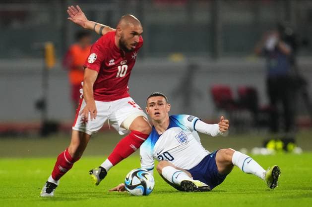 Mandatory Credit: Photo by Bagu Blanco Shutterstock (13968700br) Phil Foden of England and Teddy Teuma of Malta Malta v England, UEFA European Championship, EM, Europameisterschaft 2024 Qualifying, Group C, Football, Ta Qali Stadium, Malta - 16 June 2023 EDITORIAL USE ONLY No use with unauthorised audio, video, data, fixture lists, club league logos or live services. Online in-match use limited to 120 images, no video emulation. No use in betting, games or single club league player publications. Malta v England, UEFA European Championship 2024 Qualifying, Group C, Football, Ta Qali Stadium, Malta - 16 June 2023 EDITORIAL USE ONLY No use with unauthorised audio, video, data, fixture lists, club league logos or live services. Online in-match use limited to 120 images, no video emulation. No use in betting, games or single club league player publications. Copyright: xBaguxBlanco Shutterstockx 13968700br