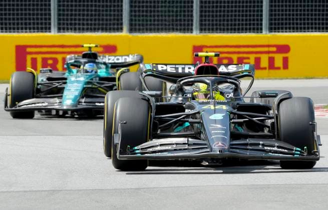 June 18, 2023, Montreal, PQ, CANADA: Mercedes driver Lewis Hamilton, of the United Kingdom, drives ahead of Aston Martin driver Fernando Alonso, of Spain, during Formula One auto racing action at the Canadian Grand Prix in Montreal, Sunday, June 18, 2023. Canada News - June 18, 2023 - ZUMAc35_ 20230618_zaf_c35_031 Copyright: xPaulxChiassonx