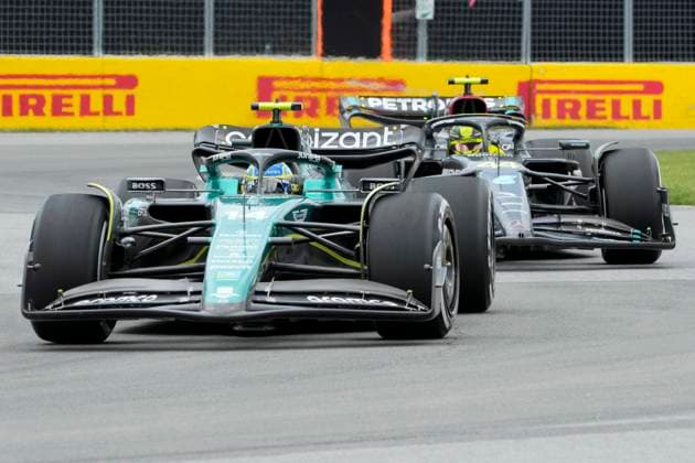 June 18, 2023, Montreal, PQ, CANADA: Aston Martin driver Fernando Alonso, of Spain, pulls ahead of Mercedes driver Lewis Hamilton, of the United Kingdom, during Formula One auto racing action at the Canadian Grand Prix in Montreal, Sunday, June 18, 2023. Canada News - June 18, 2023 - ZUMAc35_ 20230618_zaf_c35_045 Copyright: xPaulxChiassonx