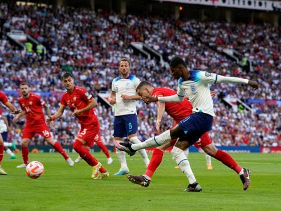 Manchester, England, 19th June 2023. Marcus Rashford of England fires in a shot during the UEFA European Championship, EM, Europameisterschaft Qualifying match at Old Trafford, Manchester. Picture credit should read: Andrew Yates Sportimage EDITORIAL USE ONLY. No use with unauthorised audio, video, data, fixture lists, club league logos or live services. Online in-match use limited to 120 images, no video emulation. No use in betting, games or single club league player publications. SPI-2485-0040