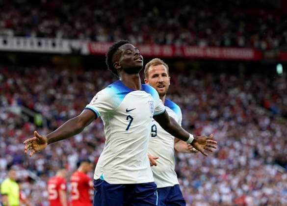Manchester, England, 19th June 2023. Bukayo Saka of England celebrates scoring his sides second goal during the UEFA European Championship, EM, Europameisterschaft Qualifying match at Old Trafford, Manchester. Picture credit should read: Andrew Yates Sportimage EDITORIAL USE ONLY. No use with unauthorised audio, video, data, fixture lists, club league logos or live services. Online in-match use limited to 120 images, no video emulation. No use in betting, games or single club league player publications. SPI-2485-0062