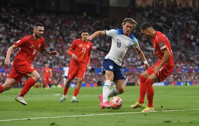 Mandatory Credit: Photo by Anna Gowthorpe Shutterstock (13975202ah) Conor Gallagher of England and Stefan Ashkovski of North Macedonia (right) England v North Macedonia, UEFA European Championship, EM, Europameisterschaft 2024 Qualifying, Group C, Football, Old Trafford, Manchester, UK - 19 June 2023 EDITORIAL USE ONLY No use with unauthorised audio, video, data, fixture lists, club league logos or live services. Online in-match use limited to 120 images, no video emulation. No use in betting, games or single club league player publications. England v North Macedonia, UEFA European Championship 2024 Qualifying, Group C, Football, Old Trafford, Manchester, UK - 19 June 2023 EDITORIAL USE ONLY No use with unauthorised audio, video, data, fixture lists, club league logos or live services. Online in-match use limited to 120 images, no video emulation. No use in betting, games or single club league player publications. Copyright: xAnnaxGowthorpe Shutterstockx 13975202ah