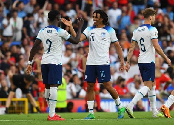 Mandatory Credit: Photo by Anna Gowthorpe Shutterstock (13975202bx) Bukayo Saka of England celebrates with Trent Alexander-Arnold after scoring his side s fourth goal England v North Macedonia, UEFA European Championship, EM, Europameisterschaft 2024 Qualifying, Group C, Football, Old Trafford, Manchester, UK - 19 June 2023 EDITORIAL USE ONLY No use with unauthorised audio, video, data, fixture lists, club league logos or live services. Online in-match use limited to 120 images, no video emulation. No use in betting, games or single club league player publications. England v North Macedonia, UEFA European Championship 2024 Qualifying, Group C, Football, Old Trafford, Manchester, UK - 19 June 2023 EDITORIAL USE ONLY No use with unauthorised audio, video, data, fixture lists, club league logos or live services. Online in-match use limited to 120 images, no video emulation. No use in betting, games or single club league player publications. Copyright: xAnnaxGowthorpe Shutterstockx 13975202bx