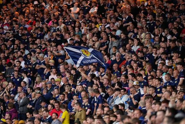 Mandatory Credit: Photo by Stuart Wallace Shutterstock (13975319dt) Scotland fans. Play was suspended after 6 minutes and didn t resume for 90 minutes due to a waterlogged pitch, caused by a heavy downpour of rain before kick off. Scotland v Georgia, UEFA European Championship, EM, Europameisterschaft 2024 Qualifying, Group A, Football, Hampden Park, Glasgow, UK - 20 June 2023 EDITORIAL USE ONLY No use with unauthorised audio, video, data, fixture lists, club league logos or live services. Online in-match use limited to 120 images, no video emulation. No use in betting, games or single club league player publications. Scotland v Georgia, UEFA European Championship 2024 Qualifying, Group A, Football, Hampden Park, Glasgow, UK - 20 June 2023 EDITORIAL USE ONLY No use with unauthorised audio, video, data, fixture lists, club league logos or live services. Online in-match use limited to 120 images, no video emulation. No use in betting, games or single club league player publications. Copyright: xStuartxWallace Shutterstockx 13975319dt