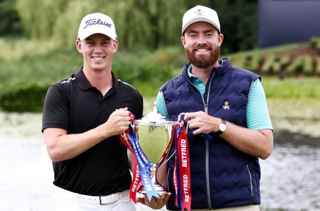 Mandatory Credit: Photo by James Marsh Shutterstock (13987427bi) Daniel Hillier of New Zealand celebrates with the trophy after winning the tournament next to his caddie. Betfred British Masters, Day Four, Golf, The Belfry Golf Club, Sutton Coldfield, UK - 02 Jul 2023 Betfred British Masters, Day Four, Golf, The Belfry Golf Club, Sutton Coldfield, UK - 02 Jul 2023 Copyright: xJamesxMarsh Shutterstockx 13987427bi