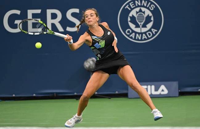 August 7, 2023, Montreal, PQ, Canada: Lucia Bronzetti, of Italy, keeps plays a shot during her first round match against Belinda Bencic, of Switzerland, at the National Bank Open tennis tournament in Montreal, Monday, August 7, 2023. Belinda Bencic, Lucia Bronzetti, - ZUMAc35_ 20230807_zaf_c35_058 Copyright: xGrahamxHughesx