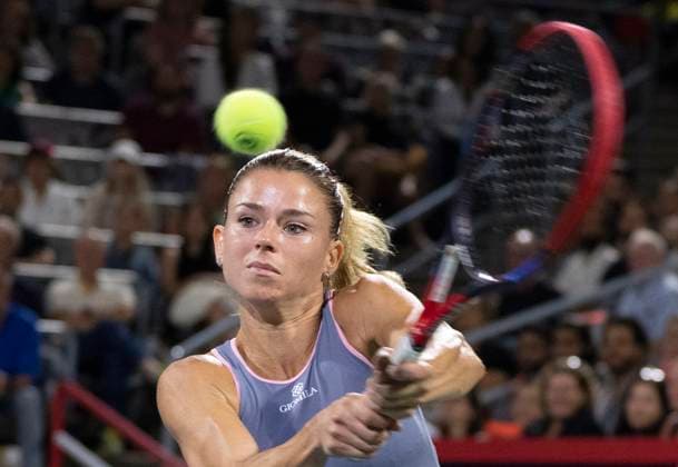 August 8, 2023, MONTREAL, PQ, Canada: Camila Giorgi of Italy, hits a return to Bianca Andreescu of Canada, during the National Bank Open tennis tournament in Montreal, Tuesday, August 8, 2023. Canada News - August 8, 2023 - ZUMAc35_ 20230808_zaf_c35_089 Copyright: xChristinnexMuschix