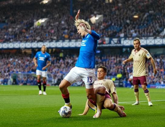 Mandatory Credit: Photo by Stuart Wallace Shutterstock (14047767b) Todd Cantwell of Rangers fouled inside the penalty area by David Douline of Servette. Penalty Rangers. Rangers v Servette, UEFA Champions League, Third Qualifying Round, Football, Ibrox Stadium, Glasgow, UK - 09 Aug 2023 EDITORIAL USE ONLY No use with unauthorised audio, video, data, fixture lists, club league logos or live services. Online in-match use limited to 120 images, no video emulation. No use in betting, games or single club league player publications. Rangers v Servette, UEFA Champions League, Third Qualifying Round, Football, Ibrox Stadium, Glasgow, UK - 09 Aug 2023 EDITORIAL USE ONLY No use with unauthorised audio, video, data, fixture lists, club league logos or live services. Online in-match use limited to 120 images, no video emulation. No use in betting, games or single club league player publications. Copyright: xStuartxWallace Shutterstockx 14047767b