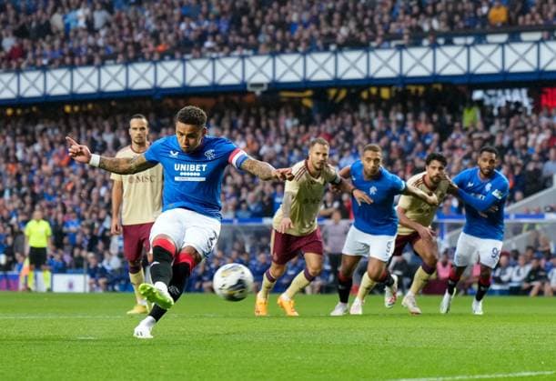 Mandatory Credit: Photo by Stuart Wallace Shutterstock (14047767h) Rangers Captain James Tavernier scores from the penalty spot to give Rangers a 1-0 lead after Todd Cantwell of Rangers was fouled inside the penalty area by David Douline of Servette. Rangers v Servette, UEFA Champions League, Third Qualifying Round, Football, Ibrox Stadium, Glasgow, UK - 09 Aug 2023 EDITORIAL USE ONLY No use with unauthorised audio, video, data, fixture lists, club league logos or live services. Online in-match use limited to 120 images, no video emulation. No use in betting, games or single club league player publications. Rangers v Servette, UEFA Champions League, Third Qualifying Round, Football, Ibrox Stadium, Glasgow, UK - 09 Aug 2023 EDITORIAL USE ONLY No use with unauthorised audio, video, data, fixture lists, club league logos or live services. Online in-match use limited to 120 images, no video emulation. No use in betting, games or single club league player publications. Copyright: xStuartxWallace Shutterstockx 14047767h