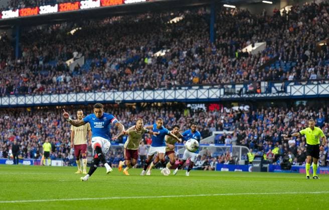 Mandatory Credit: Photo by Stuart Wallace Shutterstock (14047767j) Rangers Captain James Tavernier scores from the penalty spot to give Rangers a 1-0 lead after Todd Cantwell of Rangers was fouled inside the penalty area by David Douline of Servette. Rangers v Servette, UEFA Champions League, Third Qualifying Round, Football, Ibrox Stadium, Glasgow, UK - 09 Aug 2023 EDITORIAL USE ONLY No use with unauthorised audio, video, data, fixture lists, club league logos or live services. Online in-match use limited to 120 images, no video emulation. No use in betting, games or single club league player publications. Rangers v Servette, UEFA Champions League, Third Qualifying Round, Football, Ibrox Stadium, Glasgow, UK - 09 Aug 2023 EDITORIAL USE ONLY No use with unauthorised audio, video, data, fixture lists, club league logos or live services. Online in-match use limited to 120 images, no video emulation. No use in betting, games or single club league player publications. Copyright: xStuartxWallace Shutterstockx 14047767j