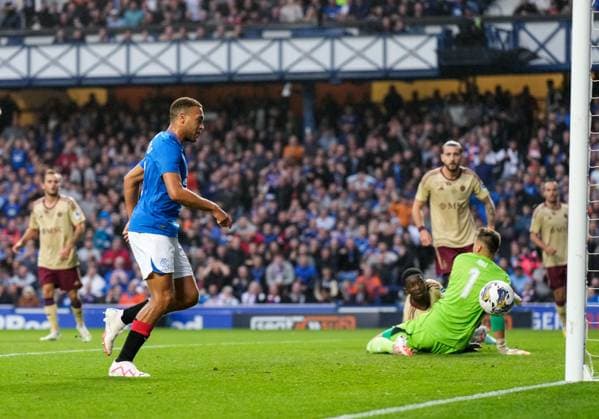 Mandatory Credit: Photo by Stuart Wallace Shutterstock (14047767n) Cyriel Dessers of Rangers scores to give Rangers a 2-0 lead. Rangers v Servette, UEFA Champions League, Third Qualifying Round, Football, Ibrox Stadium, Glasgow, UK - 09 Aug 2023 EDITORIAL USE ONLY No use with unauthorised audio, video, data, fixture lists, club league logos or live services. Online in-match use limited to 120 images, no video emulation. No use in betting, games or single club league player publications. Rangers v Servette, UEFA Champions League, Third Qualifying Round, Football, Ibrox Stadium, Glasgow, UK - 09 Aug 2023 EDITORIAL USE ONLY No use with unauthorised audio, video, data, fixture lists, club league logos or live services. Online in-match use limited to 120 images, no video emulation. No use in betting, games or single club league player publications. Copyright: xStuartxWallace Shutterstockx 14047767n