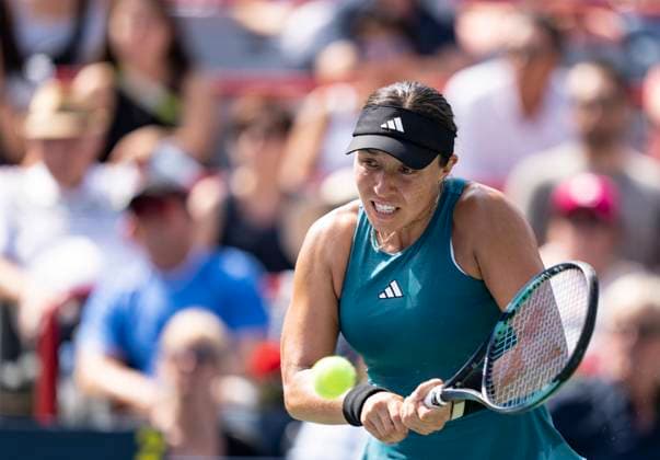 August 12, 2023, MONTREAL, PQ, Canada: Jessica Pegula of the United States, hits a return to Iga Swiatek of Poland, during semifinal action at the National Bank Open tennis tournament in Montreal, Saturday, Aug. 12, 2023. Canada News - August 12, 2023 - ZUMAc35_ 20230812_zaf_c35_019 Copyright: xChristinnexMuschix