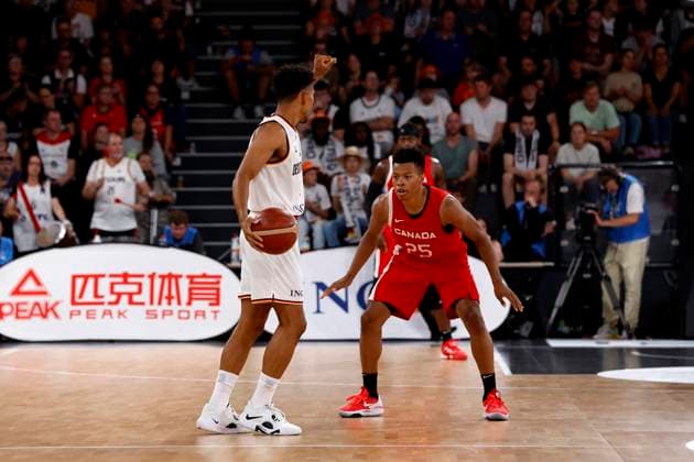 13.08.2023, Deutscher Basketball Bund, Supercup 2023, Hamburg, edel-optics.de Arena, Finale, Deutschland - Kanada, Maodo Lo (GER, No4), Trae Bell-Haynes (CAN, No25) Hamburg edel-optics.de Arena Hamburg Germany