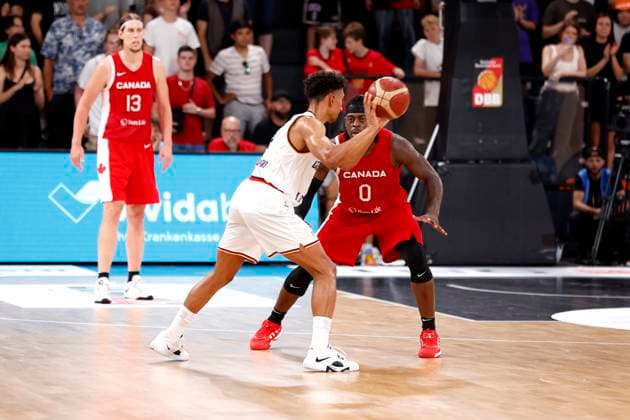 13.08.2023, Deutscher Basketball Bund, Supercup 2023, Hamburg, edel-optics.de Arena, Finale, Deutschland - Kanada, Maodo Lo (GER, No4), Luguentz Dort (CAN, No0) Hamburg edel-optics.de Arena Hamburg Germany