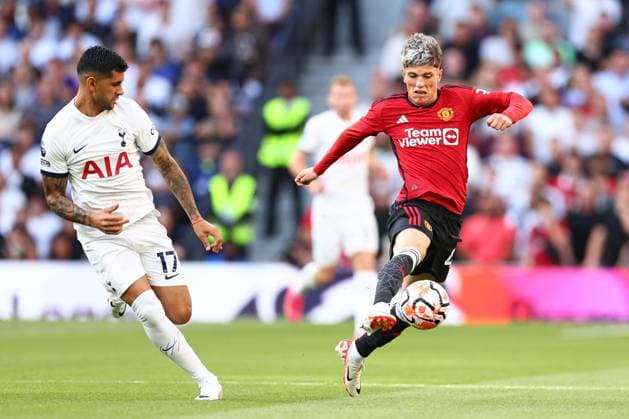 Mandatory Credit: Photo by Simon Dael Shutterstock (14056665o) Alejandro Garnacho of Manchester United, ManU under pressure from Cristian Romero of Tottenham Tottenham Hotspur v Manchester United, Premier League, Football, Tottenham Hotspur Stadium, London, UK - 19 Aug 2023 EDITORIAL USE ONLY No use with unauthorised audio, video, data, fixture lists, club league logos or live services. Online in-match use limited to 120 images, no video emulation. No use in betting, games or single club league player publications. Tottenham Hotspur v Manchester United, Premier League, Football, Tottenham Hotspur Stadium, London, UK - 19 Aug 2023 EDITORIAL USE ONLY No use with unauthorised audio, video, data, fixture lists, club league logos or live services. Online in-match use limited to 120 images, no video emulation. No use in betting, games or single club league player publications. Copyright: xSimonxDael Shutterstockx 14056665o