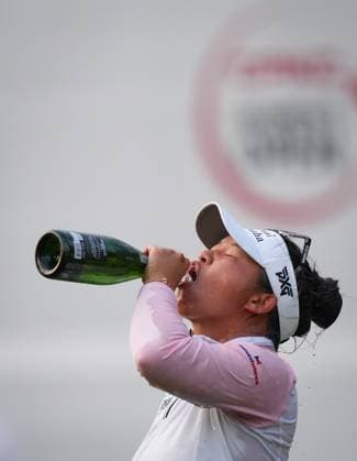 August 27, 2023, VANCOUVER, BC, CANADA: Megan Khang, of the U.S., drinks champagne after winning the LPGA, Golf Damen CPKC Canadian Women s Open golf tournament on the first playoff hole, in Vancouver, on Sunday, August 27, 2023. Canada News - August 27, 2023 - ZUMAc35_ 20230827_zaf_c35_156 Copyright: xDarrylxDyckx