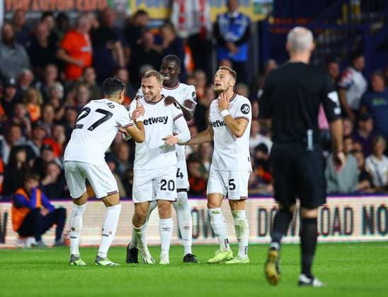 Mandatory Credit: Photo by Michael Zemanek Shutterstock (14074701w) Jarrod Bowen of West Ham United celebrates scoring the opening goal with team-mates Luton Town v West Ham United, Premier League, Football, Kenilworth Road, Luton, UK - 01 Sep 2023 EDITORIAL USE ONLY No use with unauthorised audio, video, data, fixture lists, club league logos or live services. Online in-match use limited to 120 images, no video emulation. No use in betting, games or single club league player publications. Luton Town v West Ham United, Premier League, Football, Kenilworth Road, Luton, UK - 01 Sep 2023 EDITORIAL USE ONLY No use with unauthorised audio, video, data, fixture lists, club league logos or live services. Online in-match use limited to 120 images, no video emulation. No use in betting, games or single club league player publications. Copyright: xMichaelxZemanek Shutterstockx 14074701w