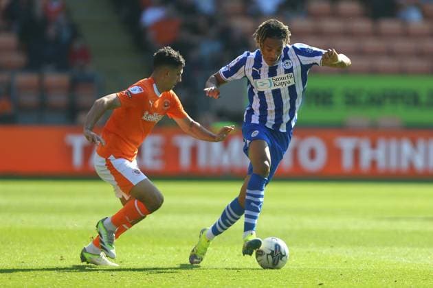 Mandatory Credit: Photo by Phil Oldham Shutterstock (14074724l) Albie Morgan of Blackpool and Sean Clare of Wigan Athletic Blackpool v Wigan Athletic, EFL Sky Bet League One, Football, Bloomfield Road, Blackpool, UK - 02 Sep 2023 EDITORIAL USE ONLY No use with unauthorised audio, video, data, fixture lists, club league logos or live services. Online in-match use limited to 120 images, no video emulation. No use in betting, games or single club league player publications. Blackpool v Wigan Athletic, EFL Sky Bet League One, Football, Bloomfield Road, Blackpool, UK - 02 Sep 2023 EDITORIAL USE ONLY No use with unauthorised audio, video, data, fixture lists, club league logos or live services. Online in-match use limited to 120 images, no video emulation. No use in betting, games or single club league player publications. Copyright: xPhilxOldham Shutterstockx 14074724l