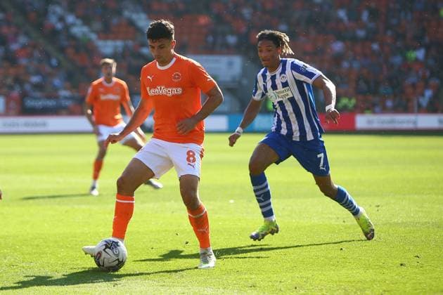 Mandatory Credit: Photo by Phil Oldham Shutterstock (14074724o) Albie Morgan of Blackpool and Sean Clare of Wigan Athletic Blackpool v Wigan Athletic, EFL Sky Bet League One, Football, Bloomfield Road, Blackpool, UK - 02 Sep 2023 EDITORIAL USE ONLY No use with unauthorised audio, video, data, fixture lists, club league logos or live services. Online in-match use limited to 120 images, no video emulation. No use in betting, games or single club league player publications. Blackpool v Wigan Athletic, EFL Sky Bet League One, Football, Bloomfield Road, Blackpool, UK - 02 Sep 2023 EDITORIAL USE ONLY No use with unauthorised audio, video, data, fixture lists, club league logos or live services. Online in-match use limited to 120 images, no video emulation. No use in betting, games or single club league player publications. Copyright: xPhilxOldham Shutterstockx 14074724o
