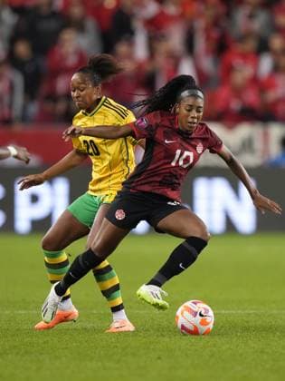 September 26, 2023, Toronto, ON, CANADA: Canada s Ashley Lawrence,10, battles Jamaica s Atlanta Primus, 20, for the ball during first half CONCACAF women s championship soccer series match in Toronto on Tuesday Sept. 26, 2023. Canada News - September 26, 2023 - ZUMAc35_ 20230926_zaf_c35_127 Copyright: xNathanxDenettex