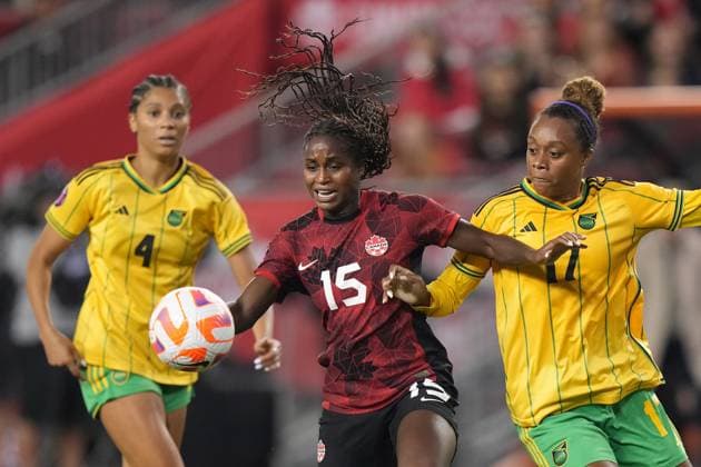 September 26, 2023, Toronto, ON, CANADA: Canada s Nichelle Prince, 15, runs onto the ball as Jamaica s Allyson Swaby, 17, defends during first half CONCACAF women s championship soccer series match in Toronto on Tuesday Sept. 26, 2023. Canada News - September 26, 2023 - ZUMAc35_ 20230926_zaf_c35_136 Copyright: xNathanxDenettex