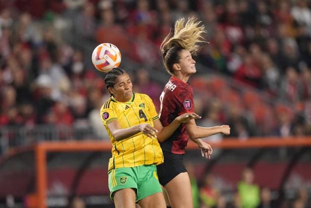 September 26, 2023, Toronto, ON, CANADA: Canada s Jordyn Huitema, 9, and Jamaica s Chantelle Swaby, 4, battle for the ball during second half CONCACAF women s championship soccer series match in Toronto on Tuesday Sept. 26, 2023. THE CANADIAN PRESS Canada News - September 26, 2023 - ZUMAc35_ 20230926_zaf_c35_147 Copyright: xNathanxDenettex
