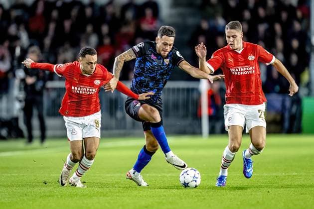 EINDHOVEN, Netherlands, 03-10-2023, SPO, Philips stadium, Champions League, season 2023 2024, PSV player Sergino Dest, Sevilla FC player Lucas Ocampos,PSV player Joey Veerman during the match PSV - Sevilla, Netherlands, Eindhoven on 3 oktober 2023 PSV - Sevilla x22612439x Copyright: