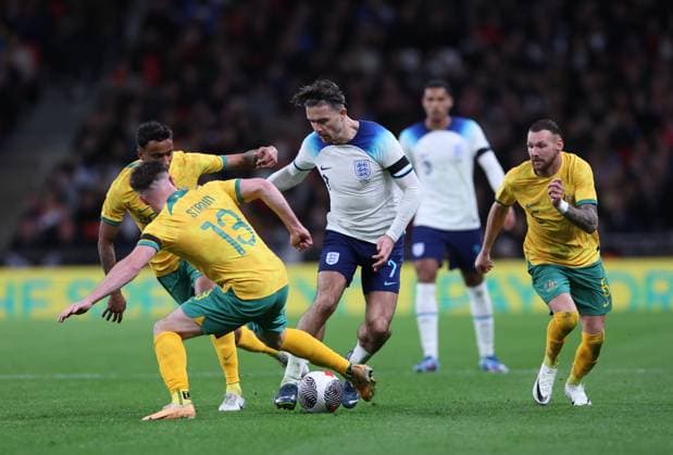 London, England, 13th October 2023. Jack Grealish of England tackled by Ryan Strain of Australia during the International Friendly, Länderspiel, Nationalmannschaft match at Wembley Stadium, London. Picture credit should read: David Klein Sportimage EDITORIAL USE ONLY. No use with unauthorised audio, video, data, fixture lists, club league logos or live services. Online in-match use limited to 120 images, no video emulation. No use in betting, games or single club league player publications. SPI-2645-0050