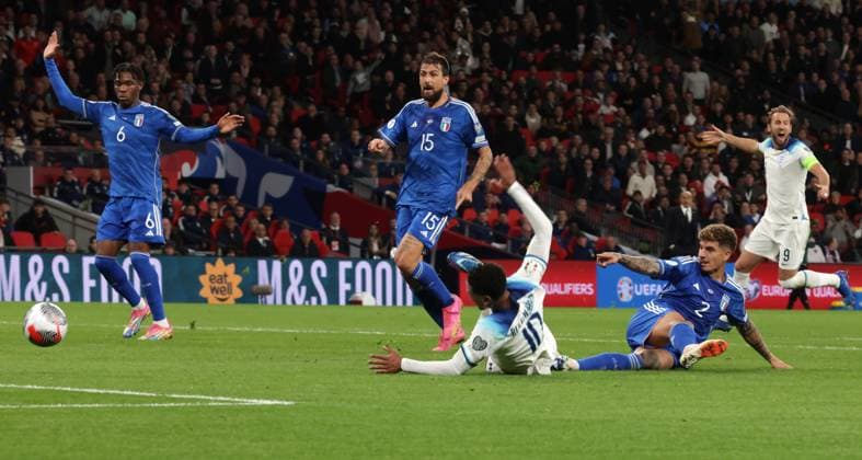 London, England, 17th October 2023. Jude Bellingham of England is fouled by Giovanni Di Lorenzo of Italy to earn the hosts a penalty which was duly converted by Harry Kane of England to level the scoreline at 1-1 during the UEFA European Championship, EM, Europameisterschaft Qualifying match at Wembley Stadium, London. Picture credit should read: Jonathan Moscrop Sportimage EDITORIAL USE ONLY. No use with unauthorised audio, video, data, fixture lists, club league logos or live services. Online in-match use limited to 120 images, no video emulation. No use in betting, games or single club league player publications. SPI-2650-0023