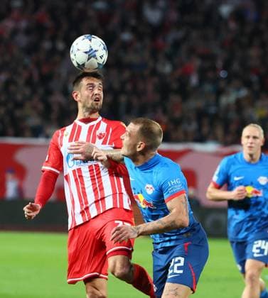 Roter Stern Belgrad - RB Leipzig Champions League Beograd, 07.11.2023, Stadion Rajko Mitic, Fussball , UEFA Champions League, Gruppe G , Spieltag 4 , Roter Stern Belgrad vs. RB Leipzig , Im Bild von li.: Srdjan Mijailovic (33, Belgrad) und David Raum (22, RB Leipzig) , Foto nur zur redaktionellen Nutzung bestimmt! . , UEFA regulations prohibit any use of photographs as image sequences and or quasi-video ,