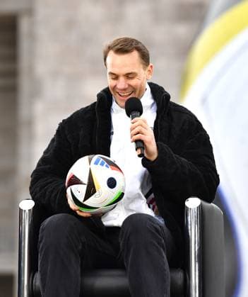 (231115) -- BERLIN, Nov. 15, 2023 -- Manuel Neuer, goalkeeper of German men s national football team, attends the unveiling event of the official match ball of UEFA EURO, EM, Europameisterschaft,Fussball 2024 in Berlin, Germany, Nov. 15, 2023. ) (SP)GERMANY-BERLIN-FOOTBALL-EURO 2024-OFFICIAL MATCH BALL-UNVEILING RenxPengfei