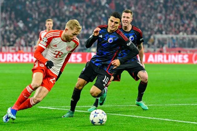 v.li.: Konrad LAIMER (FC Bayern München, FCB, 27) Mohamed ELYOUNOUSSI (FC Kopenhagen, 10) im Zweikampf, Duell, duel, tackle, Dynamik, Action, Aktion, 29.11.2023, München (Deutschland), Fussball, UEFA Champions League, Gruppenphase, FC Bayern München - FC Kopenhagen