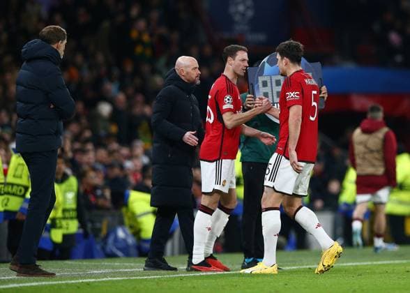Harry Maguire of Manchester United, ManU is replaced by Jonny Evans of Manchester United Manchester United v Bayern Munich, UEFA Champions League, Group A, Football, Old Trafford, Manchester, UK - 12 Dec 2023 EDITORIAL USE ONLY No use with unauthorised audio, video, data, fixture lists, club league logos or live services. Online in-match use limited to 120 images, no video emulation. No use in betting, games or single club league player publications. Copyright: xMattxWest Shutterstockx 14254194aq