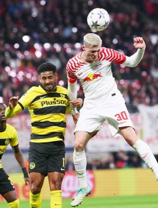 RB Leipzig - Young Boys Bern Champions League Leipzig, 13.12.2023, Red Bull Arena, Fussball , UEFA Champions League, Gruppe G , 6. Spieltag, RB Leipzig vs. Young Boys Bern , Im Bild von links: Saidy Janko ( 17, Bern), Benjamin Sesko (30, RB Leipzig). , Foto nur zur redaktionellen Nutzung bestimmt! . , UEFA regulations prohibit any use of photographs as image sequences and or quasi-video ,