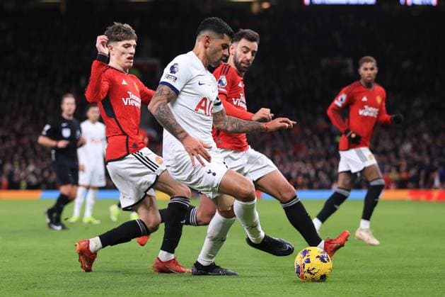 Manchester United, ManU v Tottenham Hotspur 14 January 2024 - Premier League - Manchester United v Tottenham Hotspur - Alejandro Garnacho of Manchester United, Cristian Romero of Tottenham Hotspur and Bruno Fernandes of Manchester United - Photo: Simon Stacpoole Offside. Manchester UK Copyright: xSimonxStacpoolexOffside