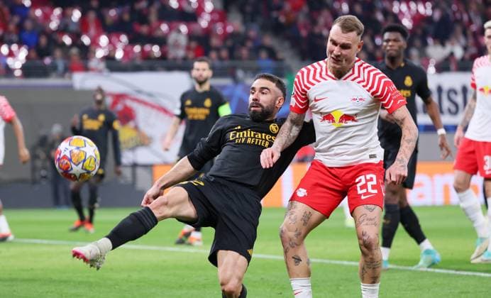 RB Leipzig - Real Madrid Champions League Leipzig, 13.02.2024, Red Bull Arena, Fussball, UEFA Champions League, Achtelfinale , RB Leipzig vs. Real Madrid , Im Bild von links: Daniel Carvajal (2, Real), David Raum (22, RB Leipzig). , Only editorial use. , UEFA regulations prohibit any use of photographs as image sequences and or quasi-video ,