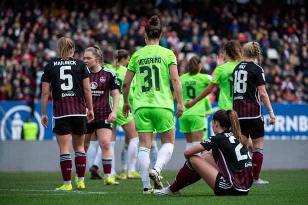 Marina Hegering (VfL Wolfsburg, 31) freut sich ueber das Tor zum 1:9, Nele Bauereisen (FC Nuernberg, 23), Alina Mailbeck (FC Nuernberg, 05) aergert sich, GER, FC Nuernberg vs VfL Wolfsburg, Fussball Google Pixel Frauen Bundesliga, 14. Spieltag, Saison 2023 2024, 17.02.2024 DFB regulations prohibit any use of photographs as image sequences and or quasi-video GER, FC Nuernberg vs VfL Wolfsburg, Fussball Google Pixel Frauen Bundesliga, 14. Spieltag, Saison 2023 2024, 17.02.2024 Nuernberg Copyright: xEibner-Pressefoto Memmlerx EP_MMR