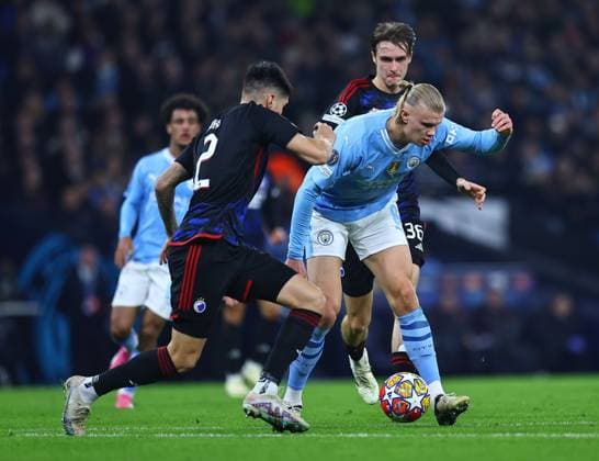 Erling Haaland of Manchester City and Kevin Diks of F.C Copenhagen Manchester City v FC Copenhagen, UEFA Champions League, Round of 16, Second Leg, Football, Etihad Stadium, Manchester, UK - 06 Mar 2024 EDITORIAL USE ONLY No use with unauthorised audio, video, data, fixture lists, club league logos or live services. Online in-match use limited to 120 images, no video emulation. No use in betting, games or single club league player publications. Copyright: xMichaelxZemanek Shutterstockx 14378804u