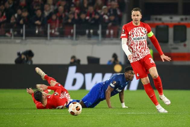 Vincenzo Grifo (SC Freiburg, 32), Mohammed Kudus (West Ham United, 14) und Christian Guenter (SC Freiburg, 30) im Kampf um den Ball , Fussball, UEFA Europa League, Achtelfinale, 2023 2024, SC Freiburg vs. West Ham United, 07.03.2024, Europa-Park Stadion , Freiburg im Breisgau, Deutschland Freiburg im Breisgau Europa-Park Stadion Baden-Wuerttemberg Deutschland Copyright: xGrantxHubbsx