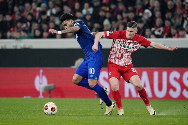 Lucas Paqueta of West Ham takes on Roland Sallai of SC Freiburg Freiburg v West Ham United, UEFA Europa League, Round of 16, First Leg, Football, Stade Europa-Park, Freiburg, Germany - 07 Mar 2024 EDITORIAL USE ONLY No use with unauthorised audio, video, data, fixture lists, club league logos or live services. Online in-match use limited to 120 images, no video emulation. No use in betting, games or single club league player publications. Copyright: xDavexWinter Shutterstockx 14373670aw