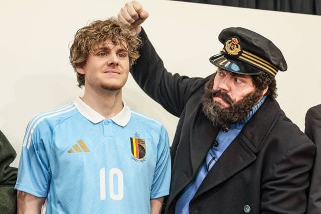 A man dressed as cartoon character Captain Haddock (R) pretends to hit one of the models showing the home and away outfits, during a press conference, PK, Pressekonferenz of Belgian national soccer team Red Devils to present the new shirts for the UEFA EURO, EM, Europameisterschaft,Fussball 2024 European Championship, EM, Europameisterschaft Thursday 14 March 2024, at the Musee Herge in Louvain-la-Neuve. The new outfit, with light blue shirt with white collar, combined with brown shorts, refers to the iconic outfit of Kuifje - Tintin, the world-famous Belgian reporter-adventurer from the Herge comic books. BRUNOxFAHY x89126420x