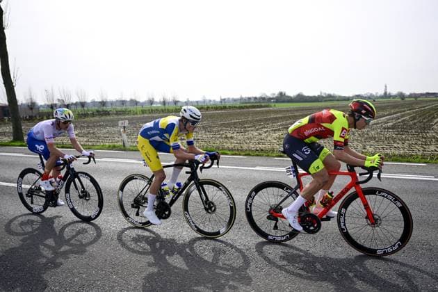 French Thomas Gachignard of TotalEnergies, Belgian Victor Vercouillie of Team Flanders Baloise and Belgian Luca De Meester of Bingoal WB pictured in action during the Classic Brugge-De Panne men s elite one-day cycling race, 198,9 km from Brugge to De Panne, Wednesday 20 March 2024. LAURIExDIEFFEMBACQ x89527815x