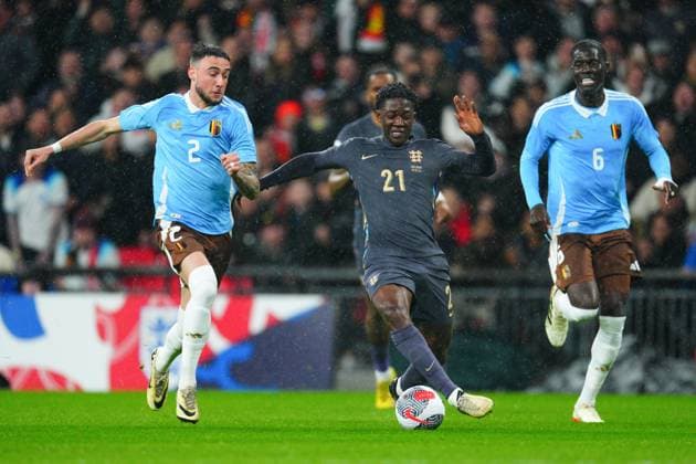 Kobbie Mainoo of England and Zeno Debast of Belgium England v Belgium, International Friendly, Länderspiel, Nationalmannschaft Football, Wembley Stadium, London, UK - 26 Mar 2024 EDITORIAL USE ONLY No use with unauthorised audio, video, data, fixture lists, club league logos or live services. Online in-match use limited to 120 images, no video emulation. No use in betting, games or single club league player publications. Copyright: xJavierxGarcia Shutterstockx 14400427az