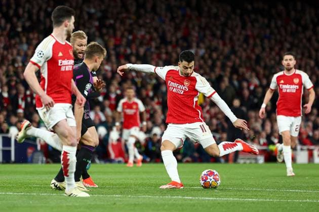 Gabriel Martinelli of Arsenal takes a shot on goal Arsenal v Bayern Munich, UEFA Champions League, Quarter Final, First Leg, Football, Emirates Stadium, London, UK - 09 Apr 2024 EDITORIAL USE ONLY No use with unauthorised audio, video, data, fixture lists, club league logos or live services. Online in-match use limited to 120 images, no video emulation. No use in betting, games or single club league player publications. Copyright: xSimonxDael Shutterstockx 14424047u