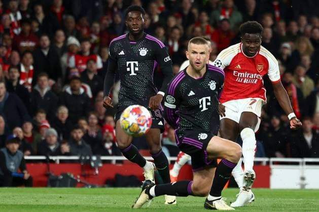 Bukayo Saka of Arsenal scores a goal for their side to make it 1-0 Arsenal v Bayern Munich, UEFA Champions League, Quarter Final, First Leg, Football, Emirates Stadium, London, UK - 09 Apr 2024 EDITORIAL USE ONLY No use with unauthorised audio, video, data, fixture lists, club league logos or live services. Online in-match use limited to 120 images, no video emulation. No use in betting, games or single club league player publications. Copyright: xSimonxDael Shutterstockx 14424047z