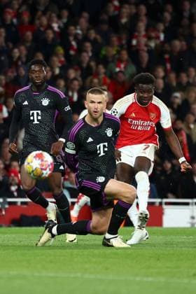Bukayo Saka of Arsenal scores a goal for their side to make it 1-0 Arsenal v Bayern Munich, UEFA Champions League, Quarter Final, First Leg, Football, Emirates Stadium, London, UK - 09 Apr 2024 EDITORIAL USE ONLY No use with unauthorised audio, video, data, fixture lists, club league logos or live services. Online in-match use limited to 120 images, no video emulation. No use in betting, games or single club league player publications. Copyright: xSimonxDael Shutterstockx 14424047aa