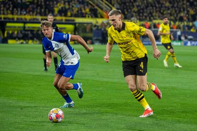 UEFA Champions League, Borussia Dortmund - Atletico Madrid, 16.04.2023 Nico Schlotterbeck (Borussia Dortmund, 4), Marcos Llorente (Atletico Madrid, 14). UEFA Champions League, Borussia Dortmund - Atletico Madrid, Rückspiel Viertelfinale, am 16.04.2023, Signal Iduna Park, Dortmund UEFA regulations prohibit any use of photographs as image sequences and or quasi-video Copyright: xBEAUTIFULxSPORTS Meuselx