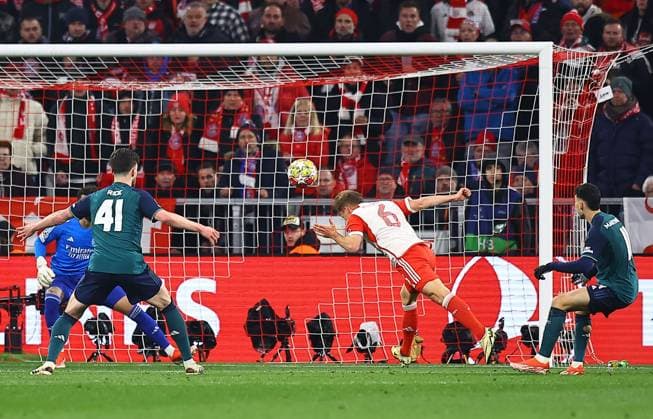 Joshua Kimmich of Bayern Munich scores the opening goal Bayern Munich v Arsenal, UEFA Champions League, Quarter Final, Second Leg, Football, Allianz Arena, Munich, Germany - 17 Apr 2024 EDITORIAL USE ONLY No use with unauthorised audio, video, data, fixture lists, club league logos or live services. Online in-match use limited to 120 images, no video emulation. No use in betting, games or single club league player publications. Copyright: xMichaelxZemanek Shutterstockx 14434936x