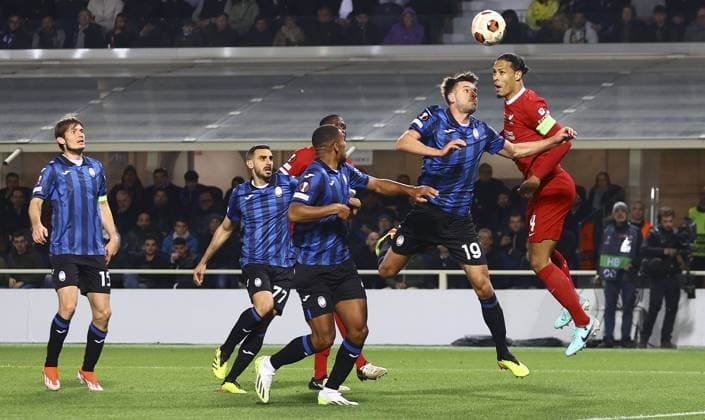 Virgil van Dijk of Liverpool has a header on goal Atalanta v Liverpool, UEFA Europa League, Quarter Final, Second Leg, Football, Gewiss Stadium, Bergamo, Italy - 18 Apr 2024 EDITORIAL USE ONLY No use with unauthorised audio, video, data, fixture lists, club league logos or live services. Online in-match use limited to 120 images, no video emulation. No use in betting, games or single club league player publications. Copyright: xKieranxMcManus Shutterstockx 14438415df