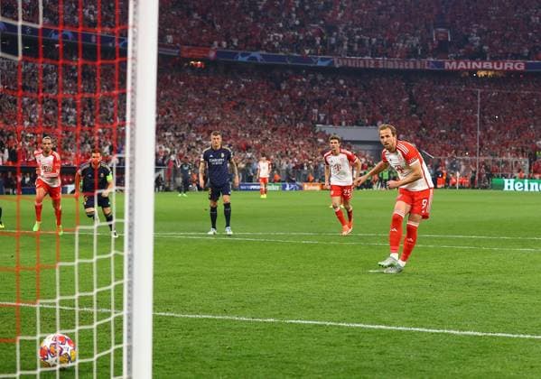 Harry Kane of Bayern Munich scores his sides second goal from penalty kick Bayern Munich v Real Madrid, UEFA Champions League, Semi Final, First Leg, Football, Allianz Arena, Munich, Germany - 30 Apr 2024 EDITORIAL USE ONLY No use with unauthorised audio, video, data, fixture lists, club league logos or live services. Online in-match use limited to 120 images, no video emulation. No use in betting, games or single club league player publications. Copyright: xMichaelxZemanek Shutterstockx 14454338al